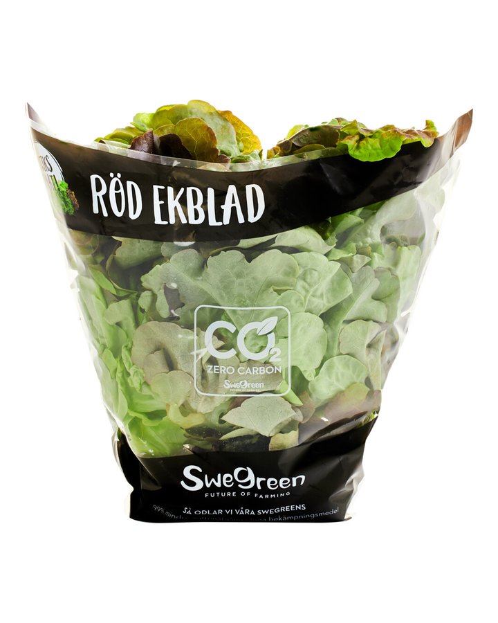 Röd ekblad i Swegreens påse märkt Butiksodlat